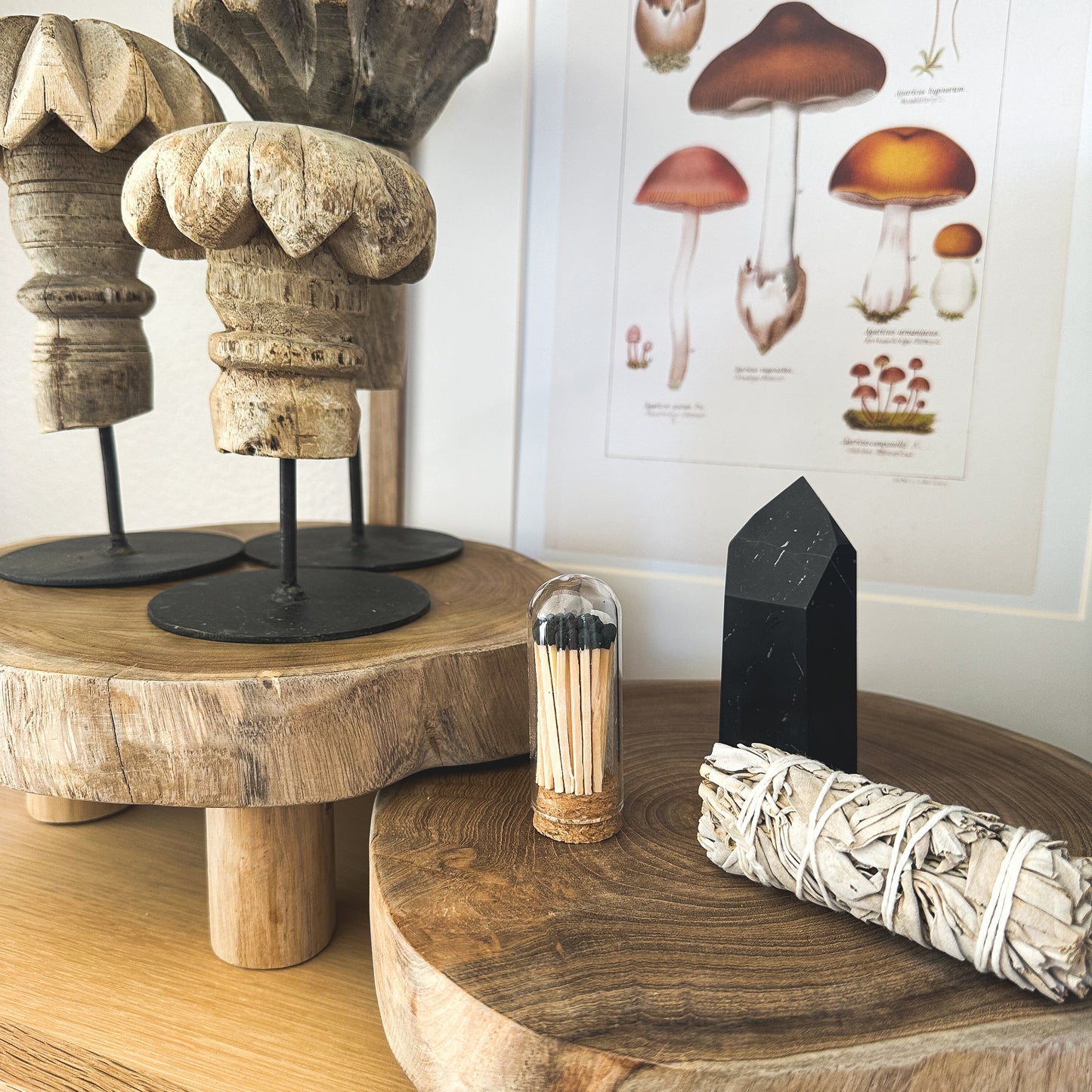 teak risers on a white ok shelf