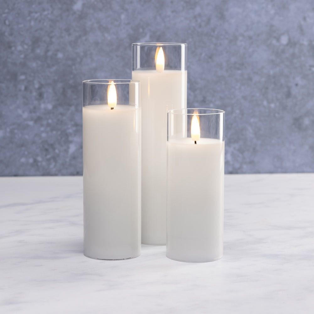 
                  
                    White Pillar Flameless LED Glass Candle Set of 3 - With Remote and Timer
                  
                